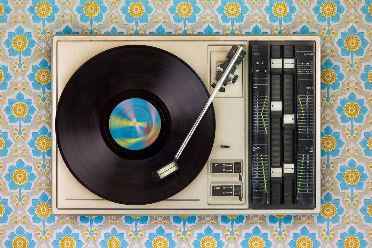 Record Player on Top of Flower Wallpaper